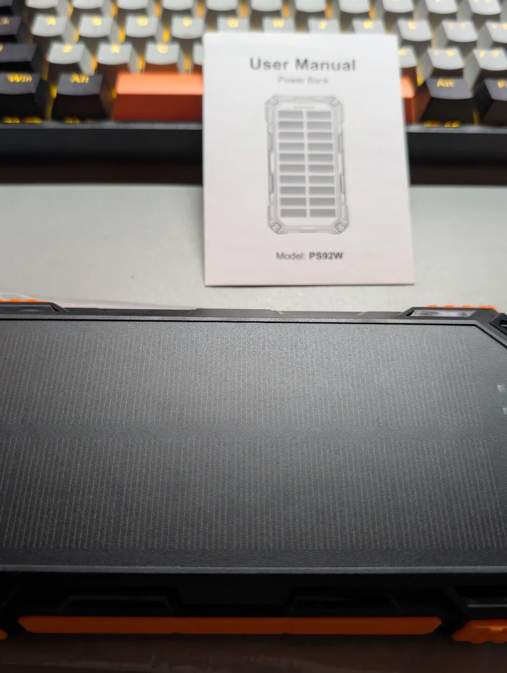 New/Sealed..42800mAh Rugged Portable Power Bank/Built-In Cables/ Wireless Pad